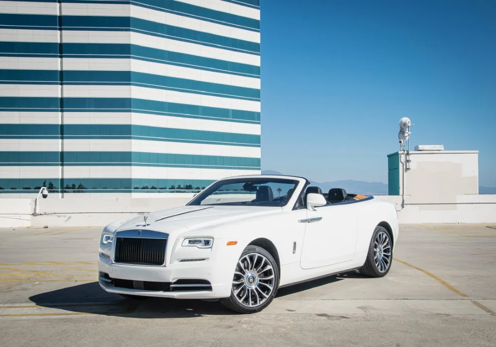 Rent the Rolls-Royce Dawn for luxury, elegance, and performance. Book your Rolls-Royce Dawn today for an unforgettable driving experience!
